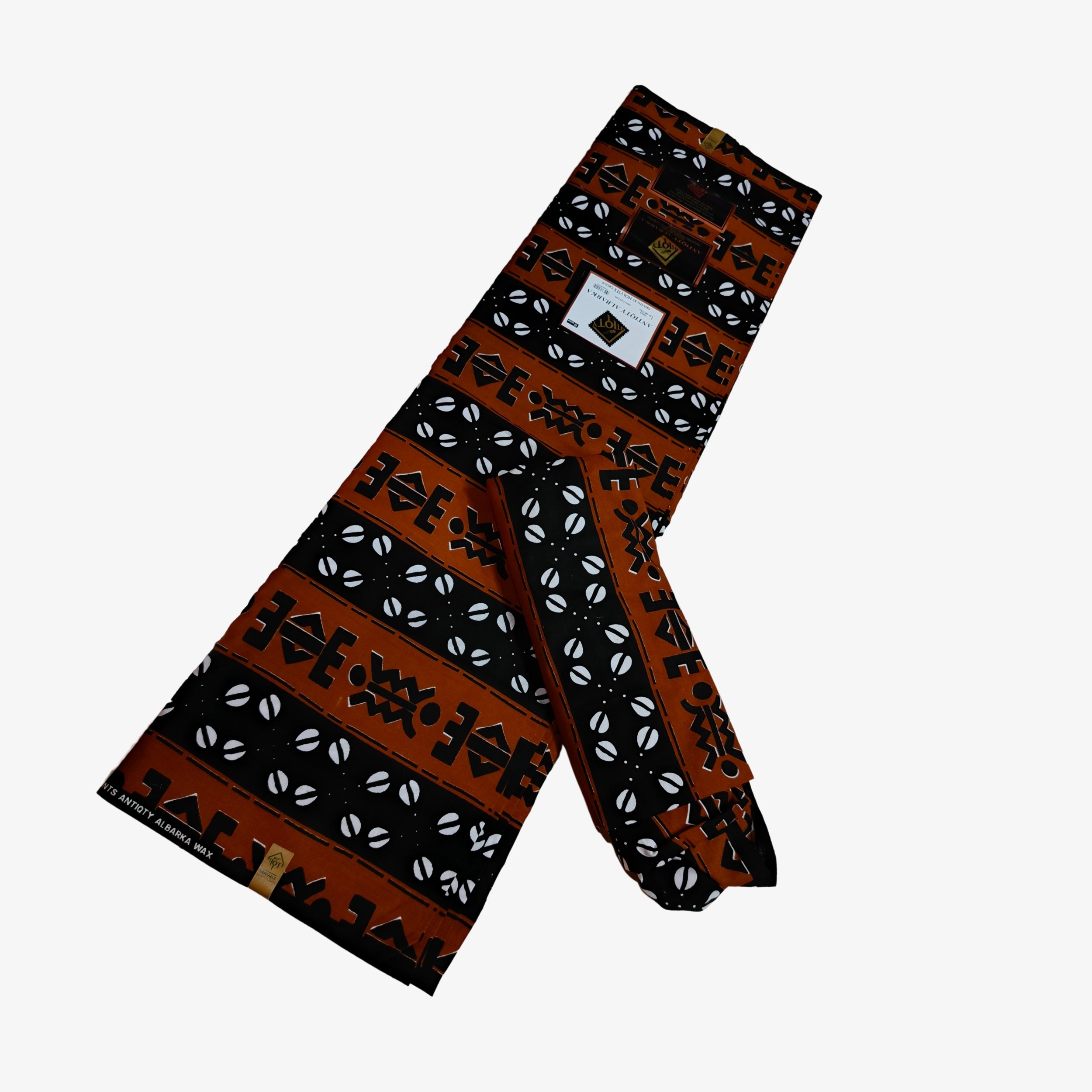 African Wax Print Fabric “Tribal Rust Cowrie” | Coul Fashion